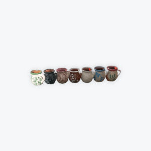 Assorted Mexican decorated clay mug